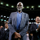 Boston Celtics legend Bill Russell stands court side during a tribute in his honor in the second quarter of an NBA basketball game against the Milwaukee Bucks in Boston, Nov. 1, 2013. The NBA great Bill Russell has died at age 88. His family said on social media that Russell died on Sunday, July 31, 2022. Russell anchored a Boston Celtics dynasty that won 11 titles in 13 years.